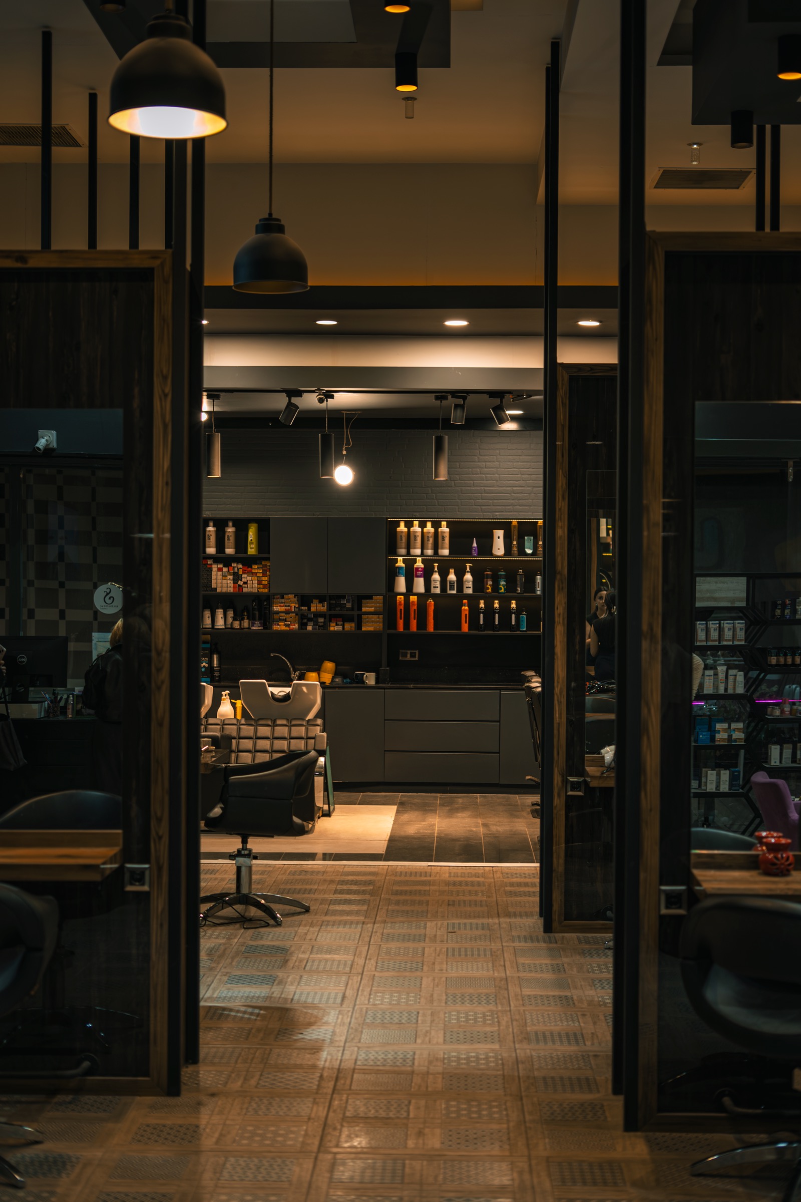 Modern hair salon interior with stylish lighting